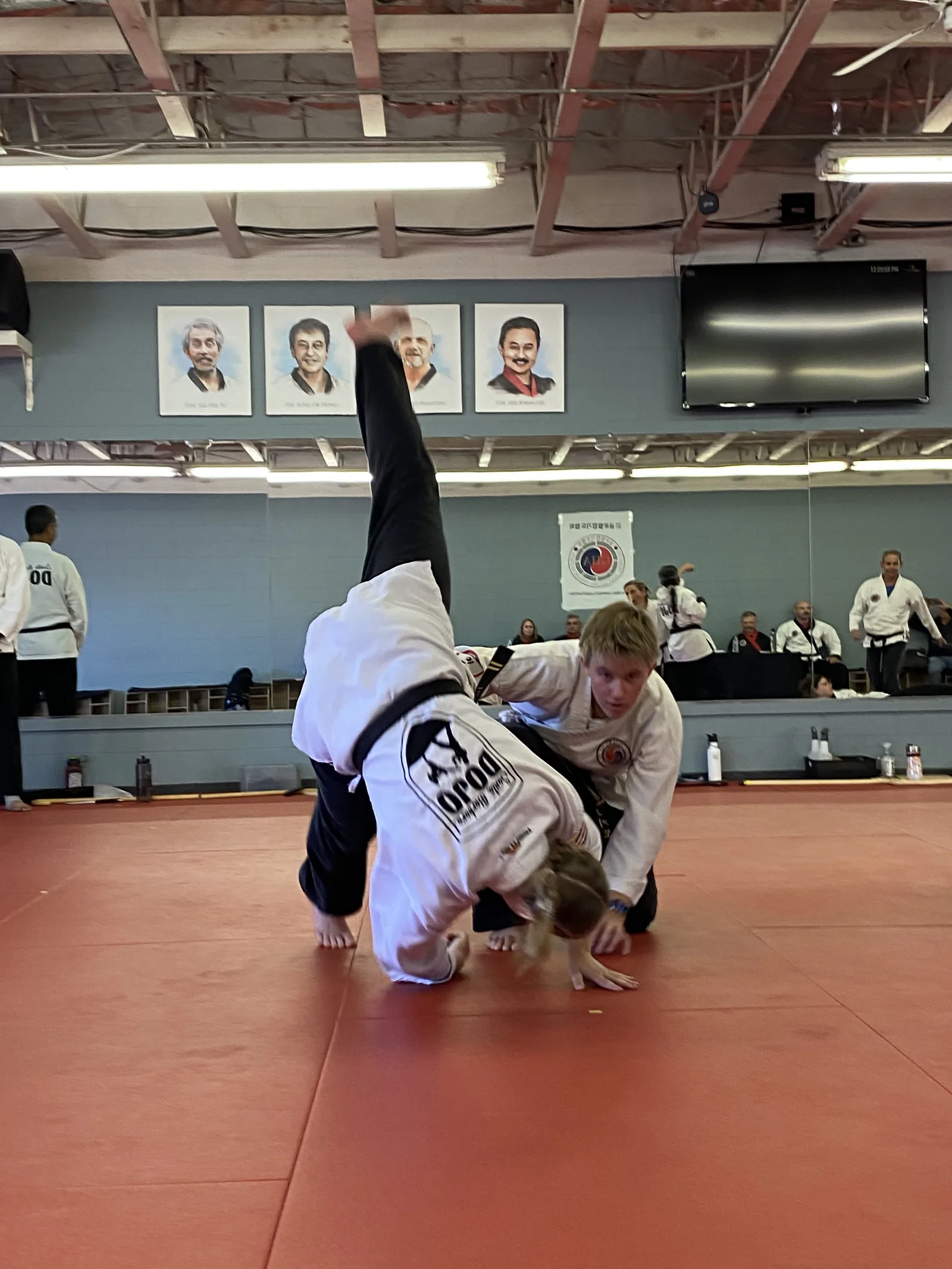 Students train during the self-defense seminar at Black Belt Weekend